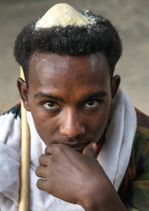 Portrait of a Raya tribe man with butter on his head to show he is on honeymoon, Amhara region, Gobiye, Ethiopia