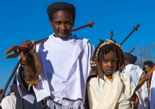 Dabale age grade boy with his father during the Gada system ceremony in Borana tribe, Oromia, Yabelo, Ethiopia