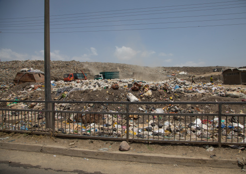 Trucks in Koshe rubbish dump, Addis Ababa region, Addis Ababa, Ethiopia