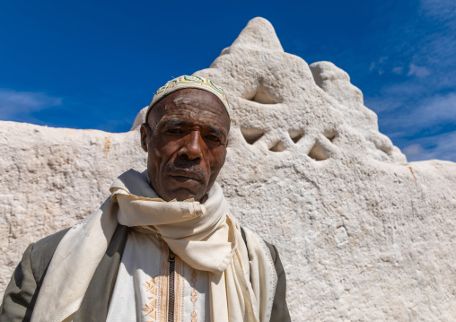 Oromo pilgrim in Sheikh Hussein shrine with jarawa powder on the face, Oromia, Sheik Hussein, Ethiopia