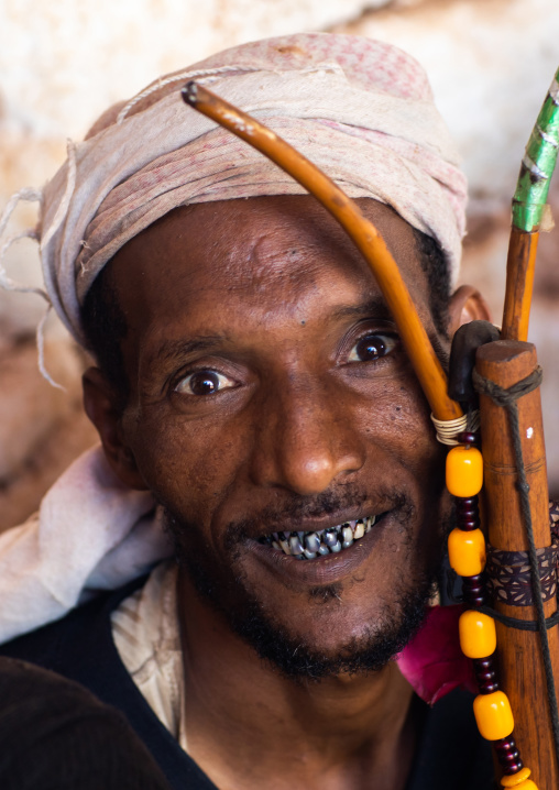 Oromo man with rooten teeth during Sheikh Hussein pilgrimage, Oromia, Sheik Hussein, Ethiopia