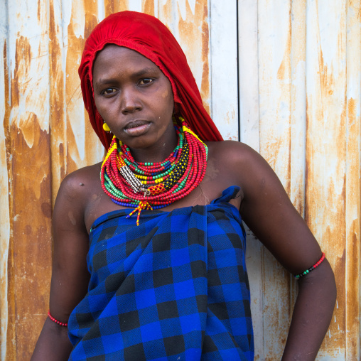 Portrait of a Dassanech woman with a red scarf, Turkana County, Omorate, Ethiopia