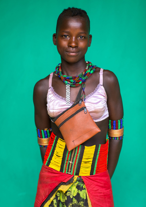 Hamer tribe woman with a bra and a beaded belt, Omo valley, Dimeka, Ethiopia