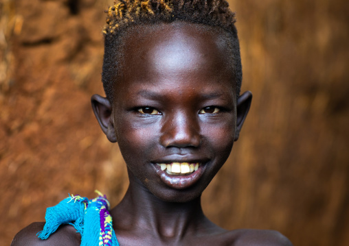 Portrait of a smiling suri tribe boy, Omo valley, Kibish, Ethiopia