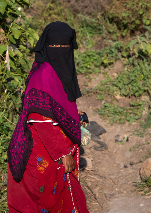 Oromo woman wearing a burqa in the market, Amhara region, Senbete, Ethiopia