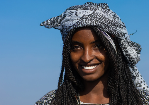 Portrait of a smiling afar woman, Afar region, Mile, Ethiopia