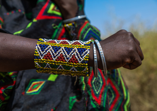 Portrait of an issa tribe woman with a beaded bracelet, Afar Region, Gewane, Ethiopia
