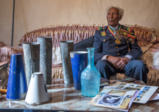 Ethiopian veteran from the italo-ethiopian war in army uniform in his home, Addis Ababa Region, Addis Ababa, Ethiopia