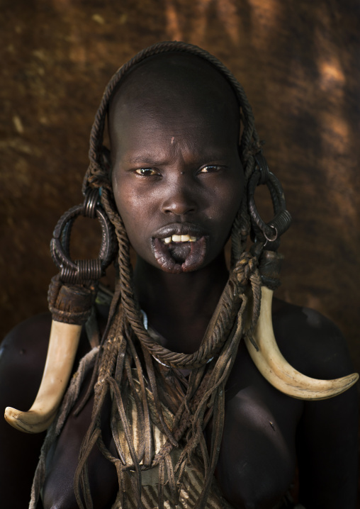 Mursi Tribe Woman With Enlarged Lip And Wearing Warthog Teeth, Chaidu, Omo Valley, Ethiopia