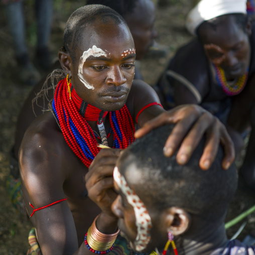 Hamar Tribe Man Doing Body Paintings At Bull Jumping Ceremony, Turmi, Omo Valley, Ethiopia