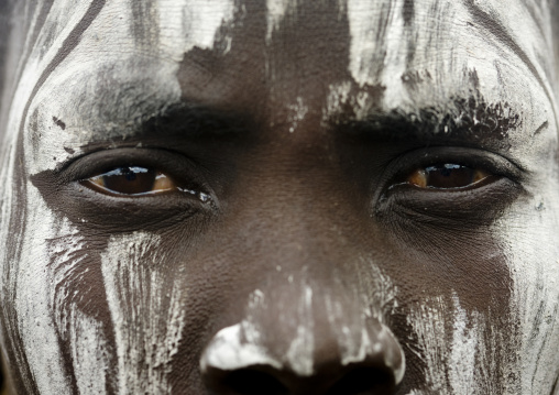 Eyes And Nose Detail Of A Mursi Tribe Woman With White Painted Face, Omo Valley, Ethiopia