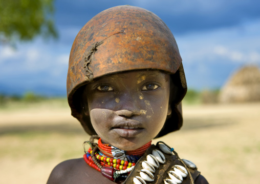 Portrait Of A Cute Erbore Child With A Calabash On His Head, Weito, Omo Valley, Ethiopia