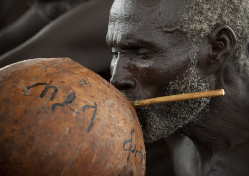 Senior Hamer Tribe Man Drinking From A Calabash, Omo Valley, Ethiopia