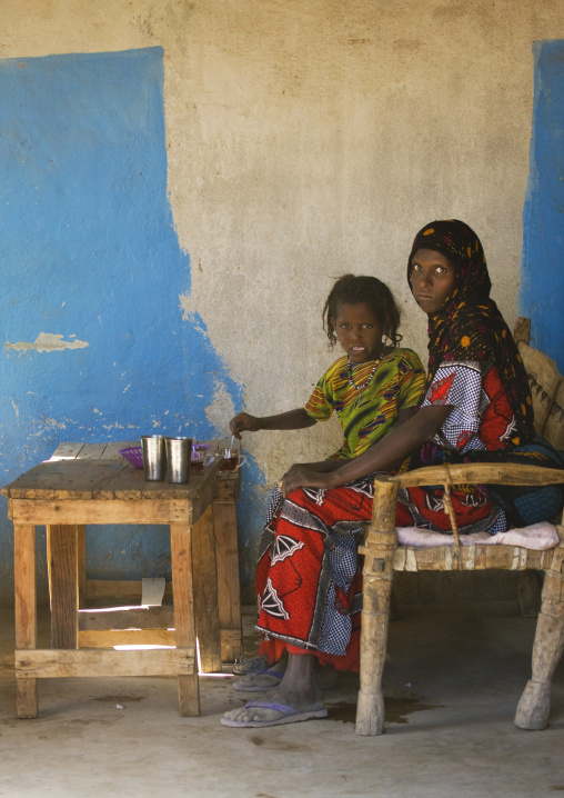 Mother and daughter drinking in a restaurant, Assaita, Afar regional state, Ethiopia
