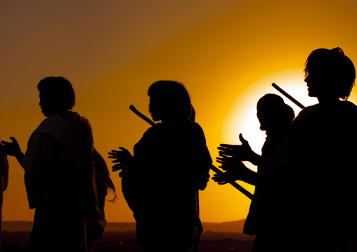 Afar tribe men at sunset, Assaita, Afar regional state, Ethiopia