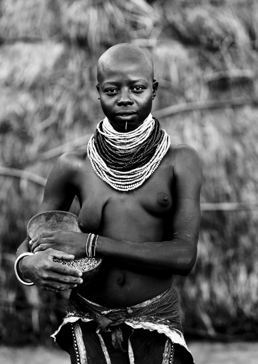Black And White Portrait Of A Karo Tribe Woman Holding A Calabash, Korcho Village, Omo Valley, Ethiopia