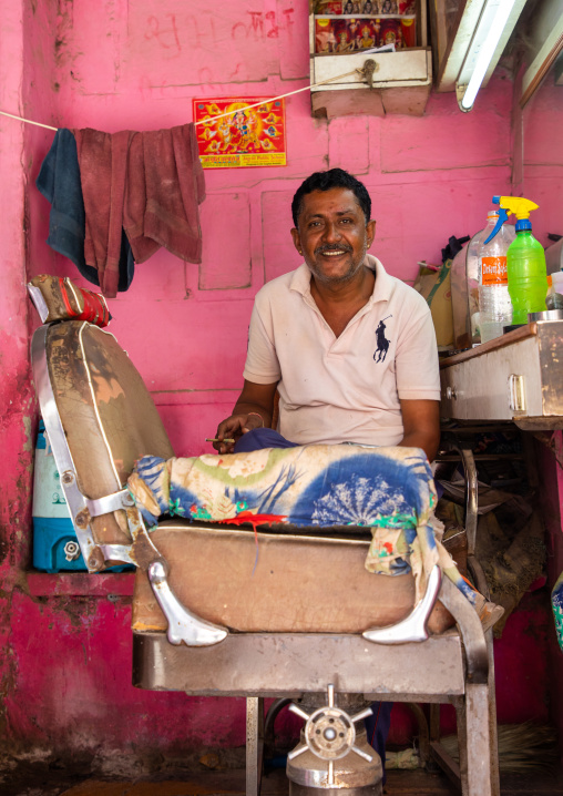 Street barber in his shop, Rajasthan, Jaisalmer, India