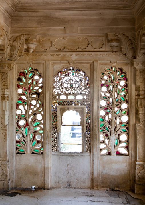 Multi coloured stained glass windows in the palace, Rajasthan, Udaipur, India