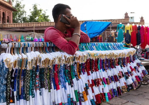 Indian man calling on his mobile phone in sardar market, Rajasthan, Jodhpur, India
