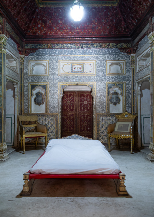 Maharaja's bedroom with gold decorated gold walls and doors inside Junagarh fort, Rajasthan, Bikaner, India