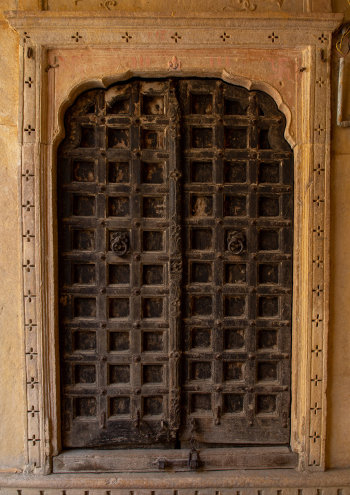 Wooden door of a room in suraj haveli hotel, Rajasthan, Jaisalmer, India