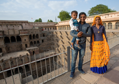 Rajasthani family in Chand Baori stepwell, Rajasthan, Abhaneri, India