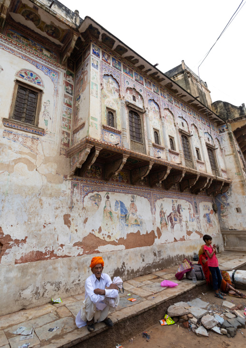 Indian people in front of an old historic haveli, Rajasthan, Nawalgarh, India