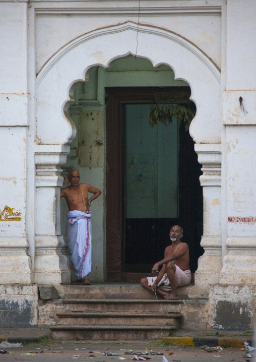 Two Priests On The Doorstep Of A Temple Looking Far Away, Mysore, India