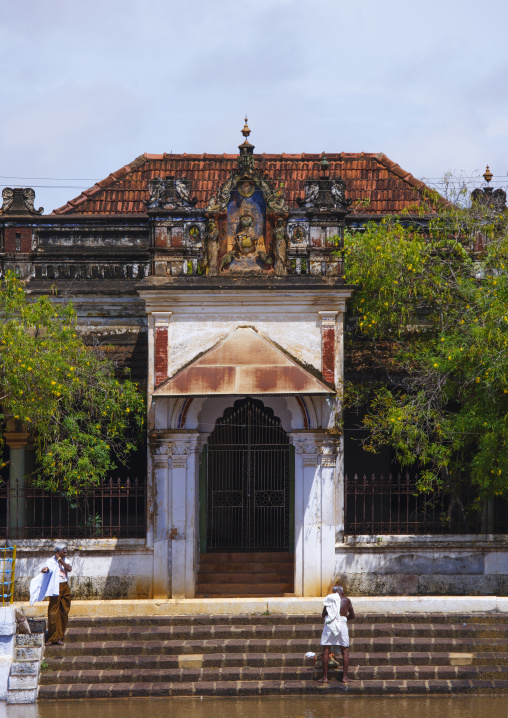 Men On The Stairs Around A Pond In Front Of A Chettiar Mansion, Kanadukathan Chettinad, India