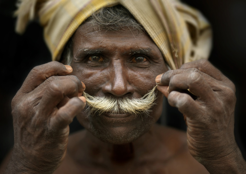 Old Coolie Holding Proudly The Tips Of His Mustache With His Fingers, Madurai, India