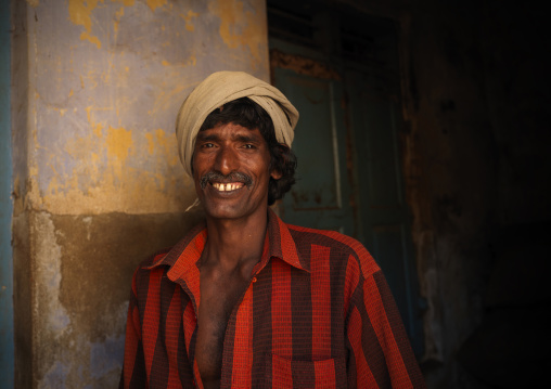 Smiling Worker In A Pepper Emporium, Kochi, India