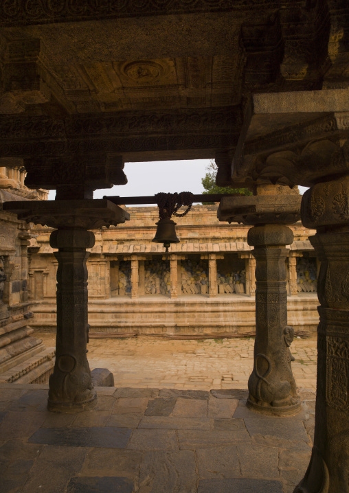 Intricately Carved Stone Pillars Holding A Bell At The Airavatesvara Temple, Darasuram, India