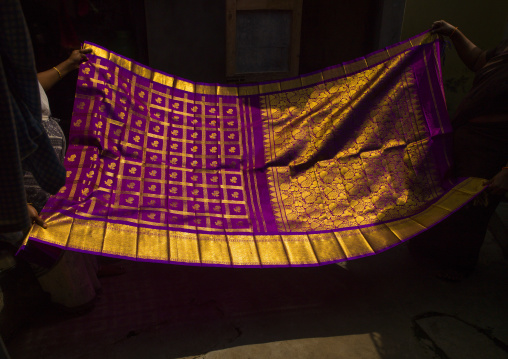 Women's Hands Folding A Colorful Sari With Gilt, Kumbakonam, India
