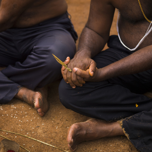 Shirtless Men Sitting On The Ground Clapping Their Hands During A Wedding, Trichy, India