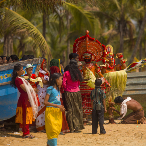 Theyyam Dancers In The Audience During Theyyam Ceremony On The Beach, Thalassery, India