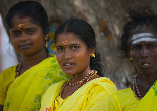 Three Women In Yellow Sari With Necklace Waiting To Cross The Street, Trichy, India