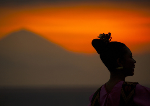 Dancer In Front Of Gunung Agung Volcano At Sunset, Mataram, Lombok Island, Indonesia