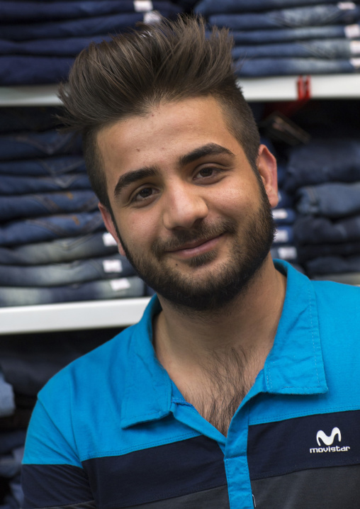 Young man with western haircut in the bazaar, Isfahan province, Isfahan, Iran