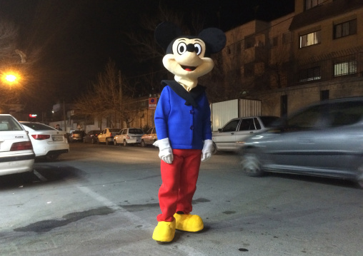 Man In A Mickey Mouse Disguise In The Street To Promote A Shop, Central District, Theran, Iran