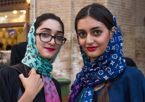 iranian young women with louis vuitton scarves, Central district, Tehran, Iran