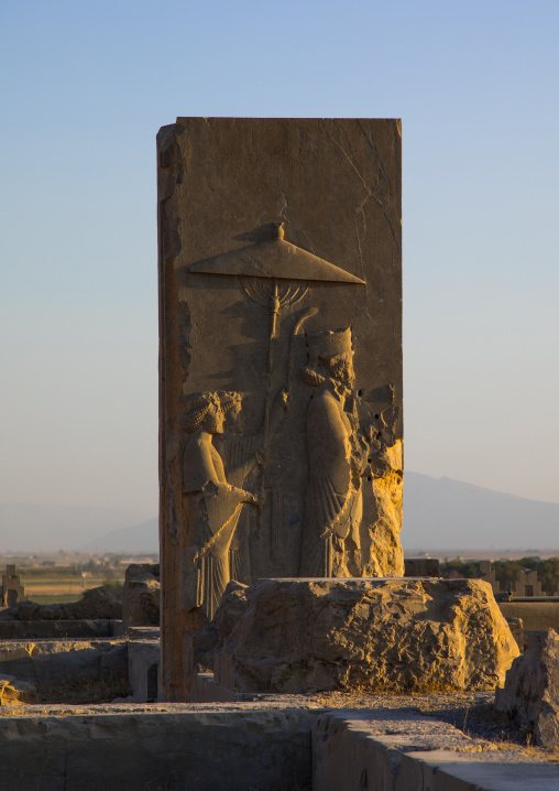 Bas-relief depicting Darius under the parasol in Persepolis, Fars Province, Marvdasht, Iran