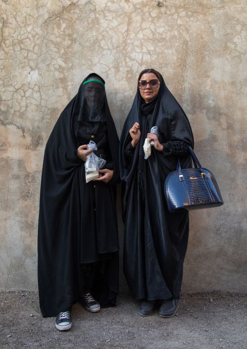 Two iranian shiite women Mourning Imam Hussein On The Day Of Tasua, Lorestan Province, Khorramabad, Iran