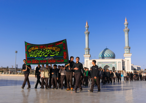 Shiite procession during Muharram passing in front of Imam Hassan mosque, Central County, Qom, Iran