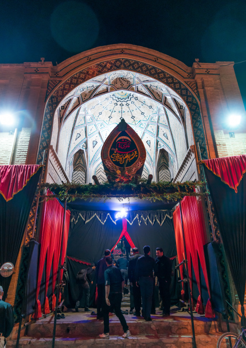 Entrance of an Hosseinieh decorated for Muharram where shiite men come to worship Imam Hussein, Isfahan Province, Kashan, Iran