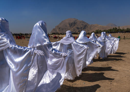 Women in white chadors during a traditional religious theatre called tazieh about Imam Hussein death in Kerbala, Lorestan Province, Khorramabad, Iran