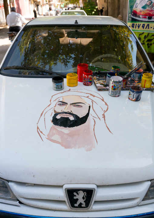 The portrait of Abbas Bin Ali on a Peugeot car for Ashura celebrations, Lorestan Province, Khorramabad, Iran