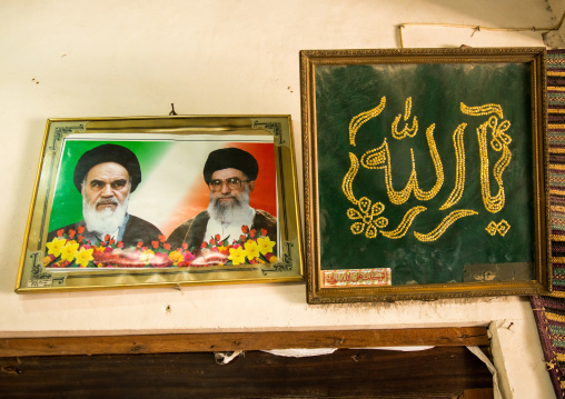 portraits of khameini and khomeini in a house, Hormozgan, Bandar-e Kong, Iran