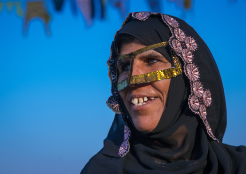 woman with a burqa mask during a wedding ceremony, Hormozgan, Kushkenar, Iran