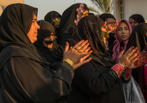 women wearing burqas masks during a wedding, Hormozgan, Kushkenar, Iran