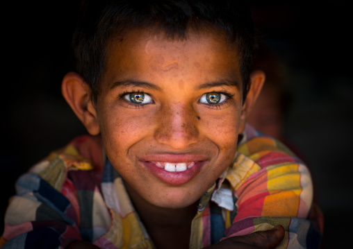 smiling gypsy boy with beautiful eyes, Central County, Kerman, Iran